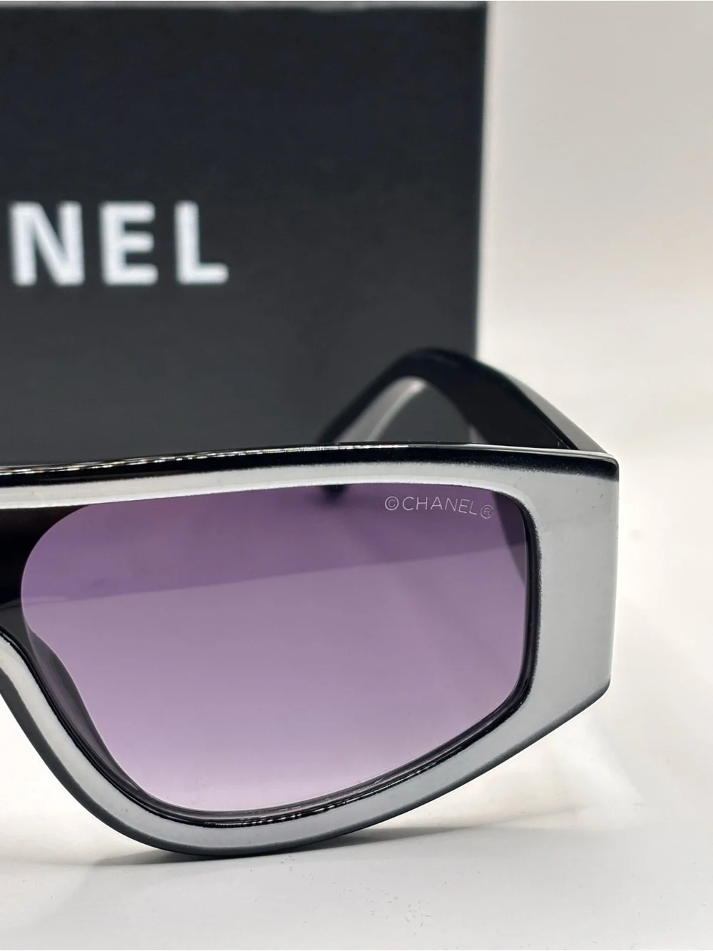 CHANEL Black Shield Sunglasses with Purple Gradient Lenses